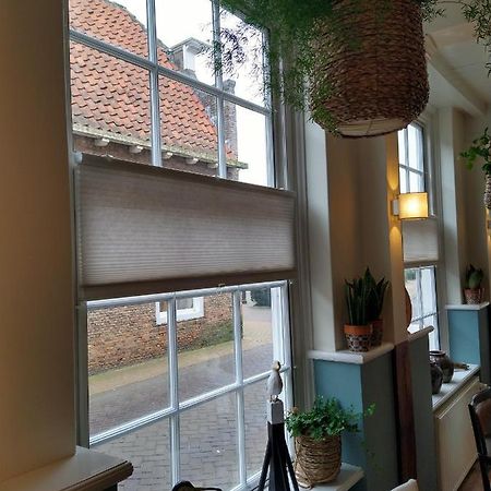 Bed & Brasserie Het Kosthuys Sint-Maartensdijk Eksteriør billede